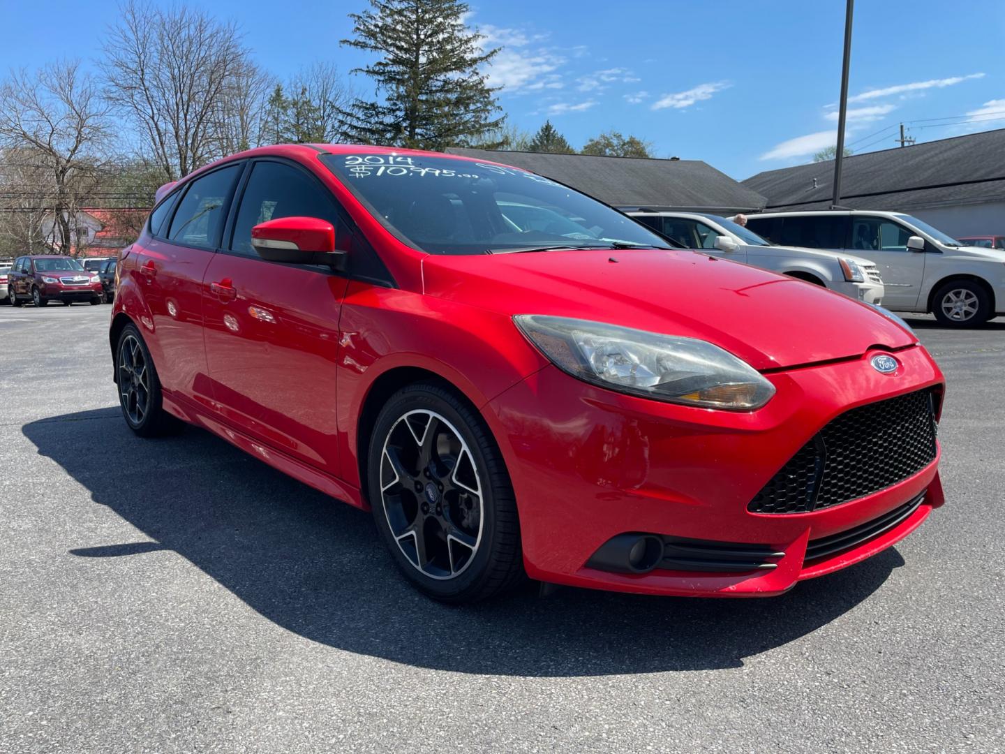 2014 Red Ford Focus ST Hatch (1FADP3L9XEL) with an 2.0L L4 DOHC 16V engine, located at 101 N. Main Street, Muncy, PA, 17756, (570) 546-5462, 41.207691, -76.785942 - Photo#1